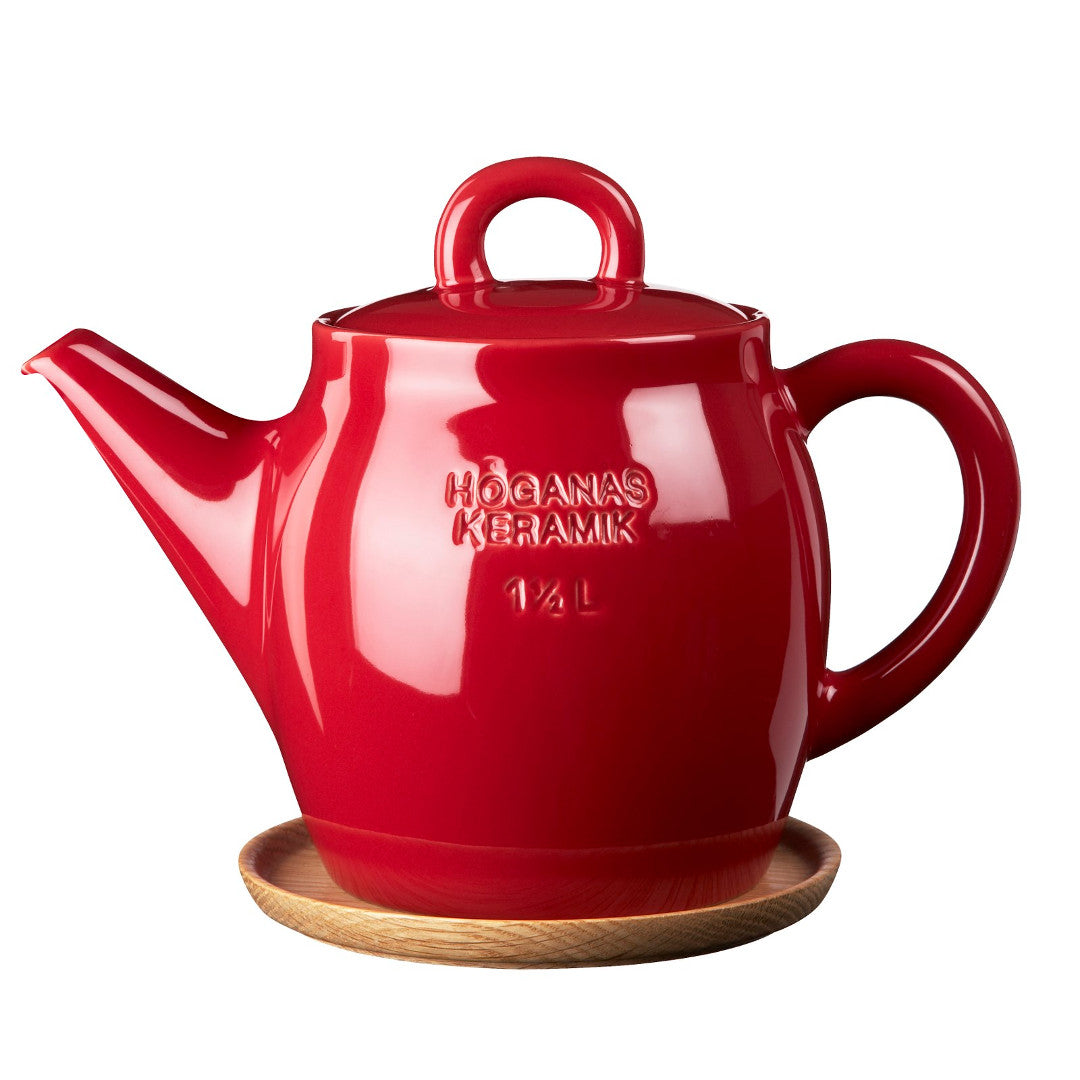 Rörstrand Höganäs Keramik tējas kanniņa 1.5l ar koka apakštasi, sarkana